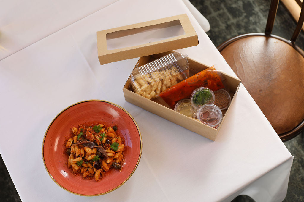 Cavatelli alla Puttanesca, garlic, tomato, olives, capers, anchovy, parsley, chilli crumbs (PS)