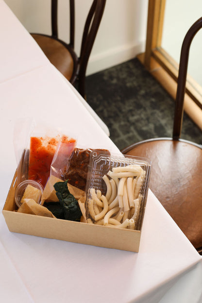 Maccheroni Beef cheek ragout, tomato, cavolo nero, parmigiano