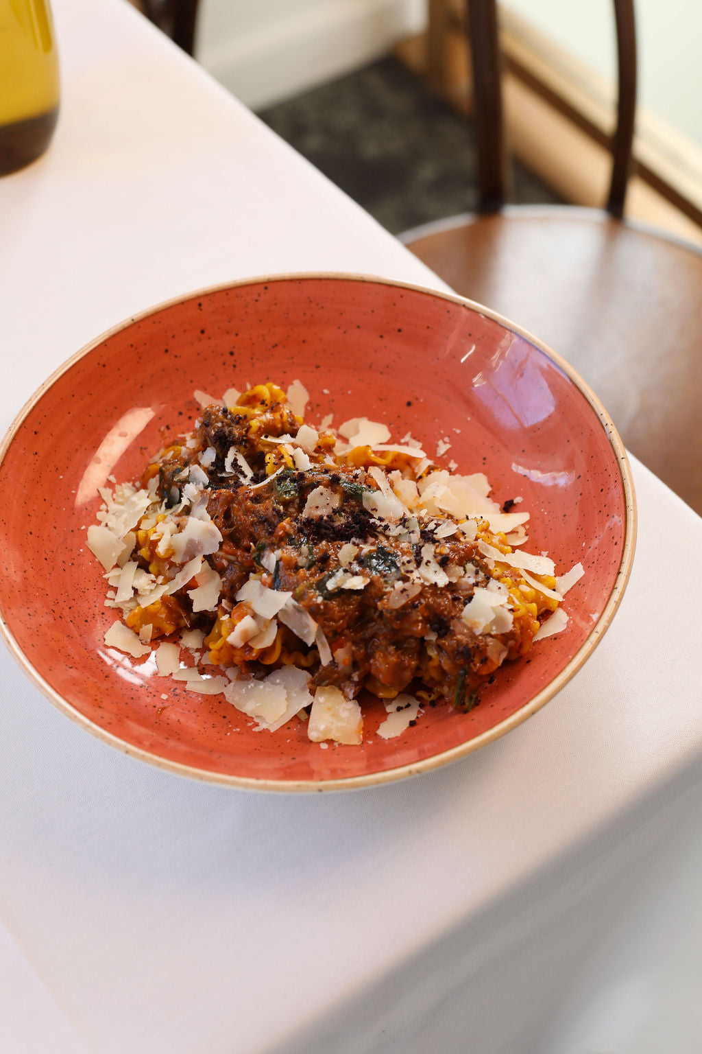 Mafaldine, garlic, wild boar ragout, napoli, chicory, olive crumbs, parmigiano reggiano, olive oil