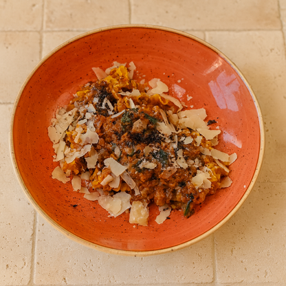 Mafaldine, garlic, wild boar ragout, napoli, chicory, olive crumbs, parmigiano reggiano, olive oil