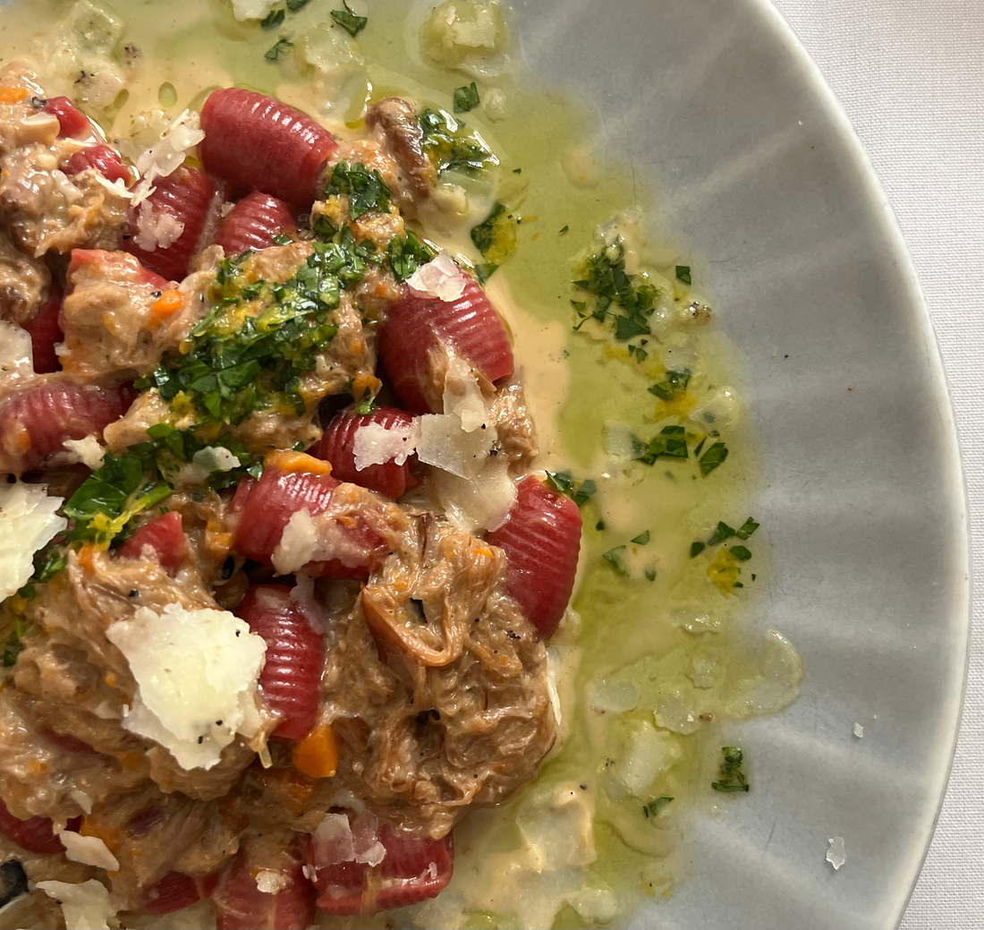Beetroot Garganelli pasta, braised lamb ragout, gremolata, ricotta salata