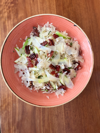 Cabbage salad, truffle pecorino, mint, cranberries, pecan, apple, palm sugar dressing