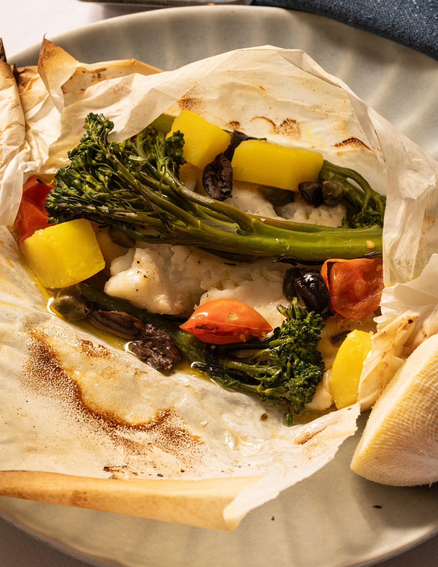 John Dory cartoccio, capers, olives, tomato, potato, broccolini