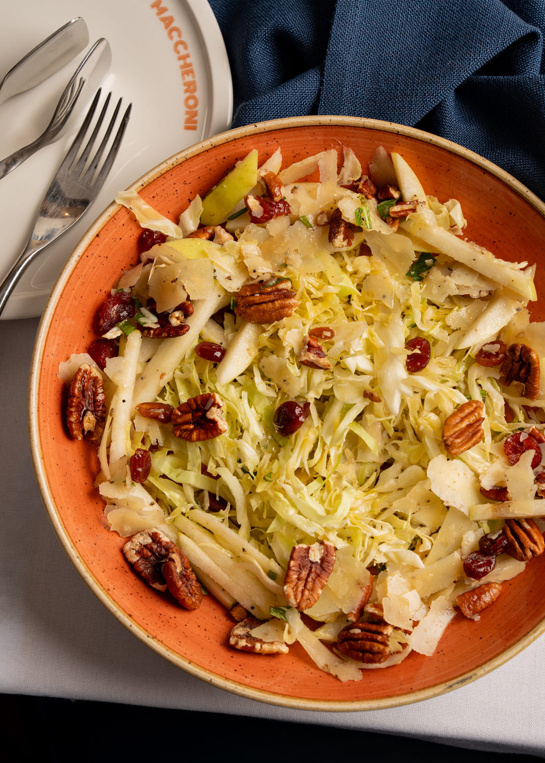 Cabbage salad, Truffle pecorino, pecan, cranberries, mint, apple