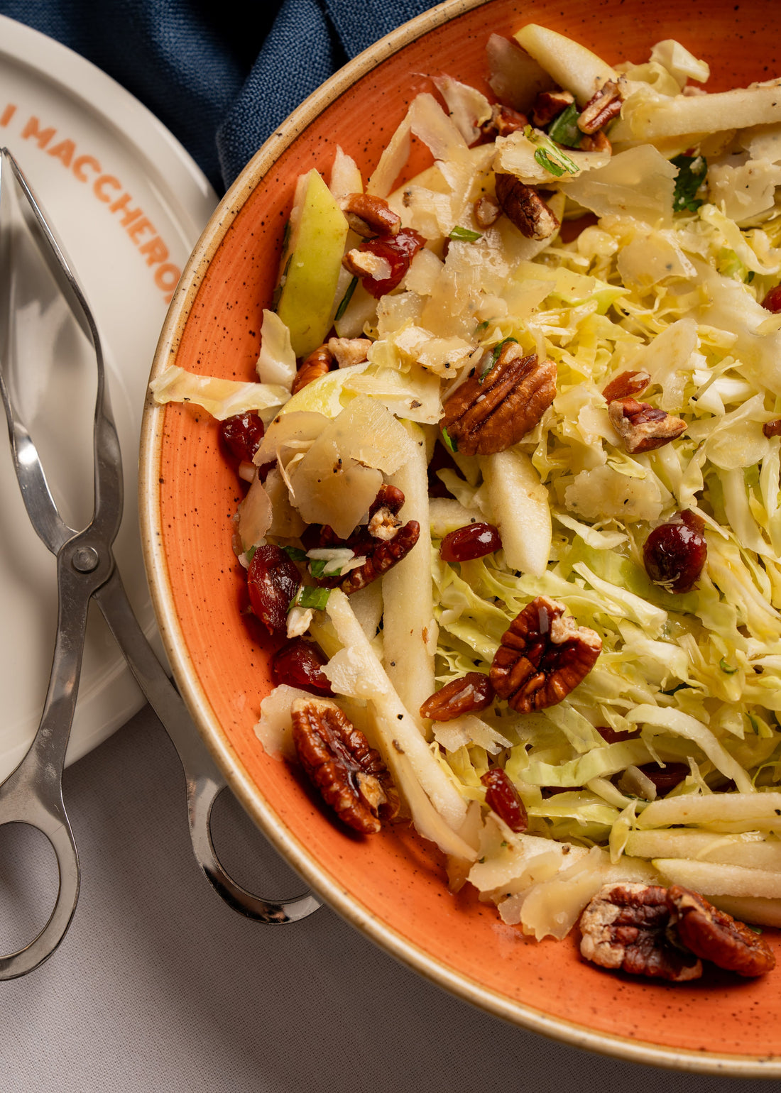 Cabbage salad, Truffle pecorino, pecan, cranberries, mint, apple