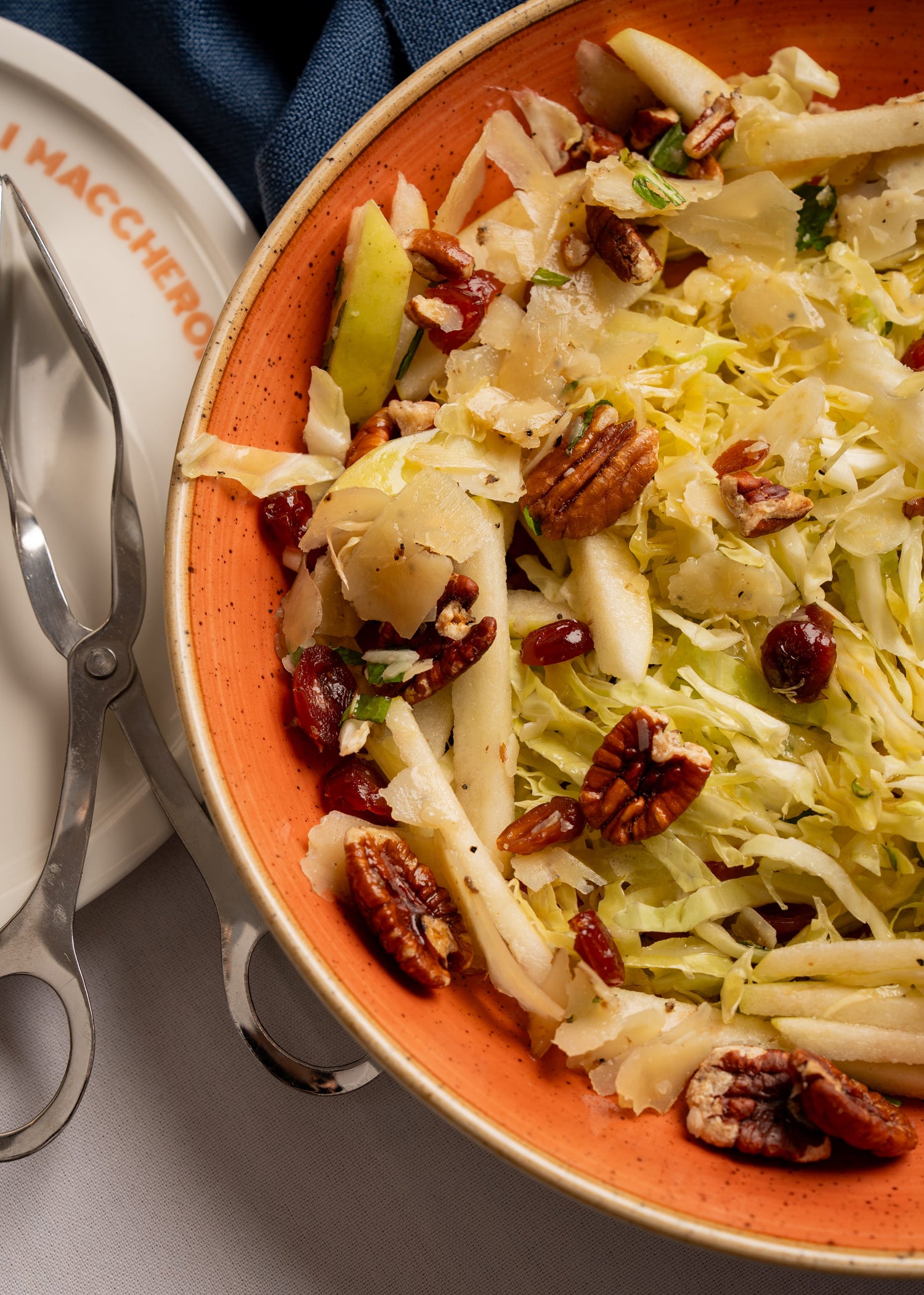Cabbage salad, Truffle pecorino, pecan, cranberries, mint, apple
