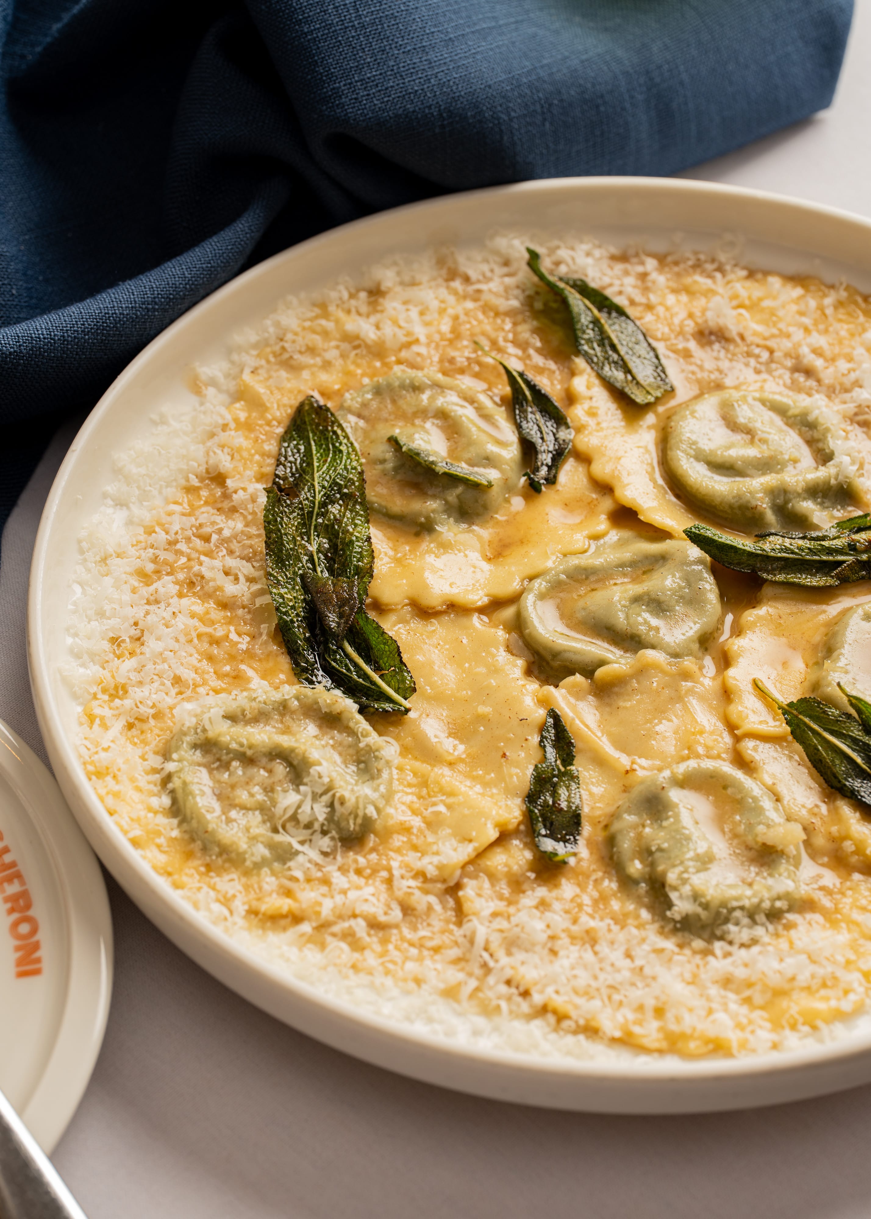 Tortellini spinach, parmigiano, leek puree &amp; sage