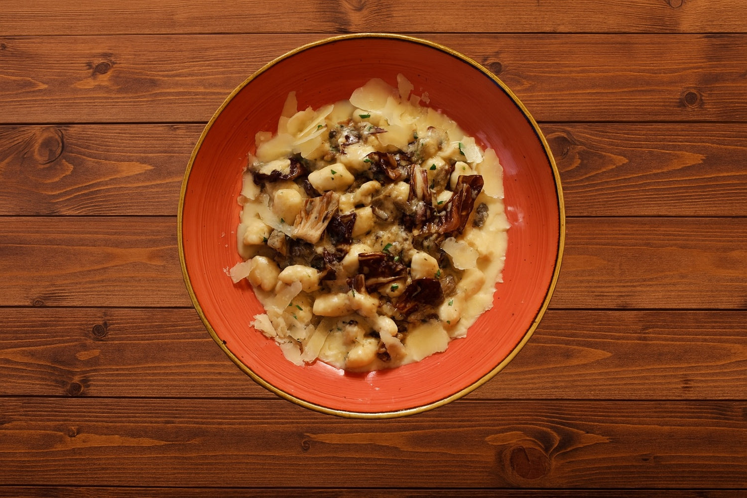 Ricotta Gnocchi with Porcini mushroom ragout, walnut, radicchio, gorgonzola, thyme