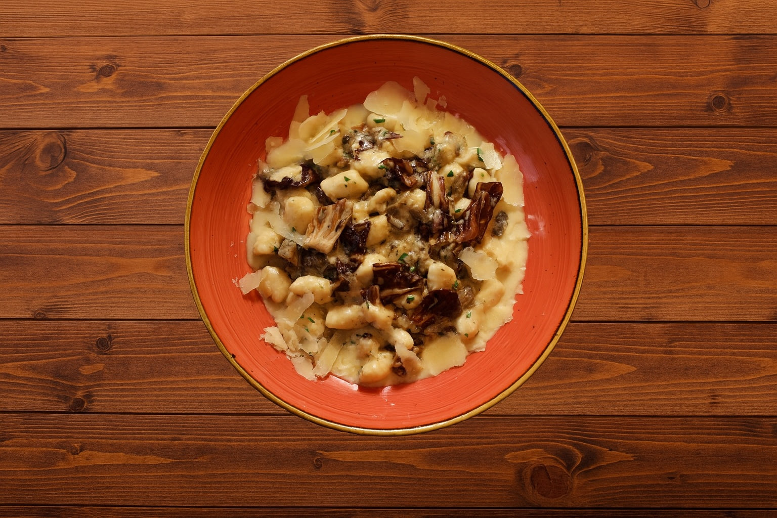 Ricotta Gnocchi with Porcini mushroom ragout, walnut, radicchio, gorgonzola, thyme